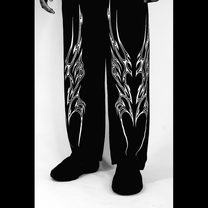 Black pants with white abstract designs
